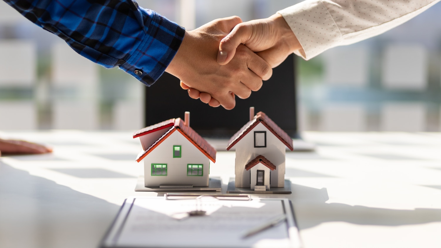 Shaking hands over a home contract